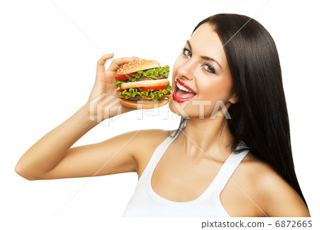 girl holding hamburger 6872665