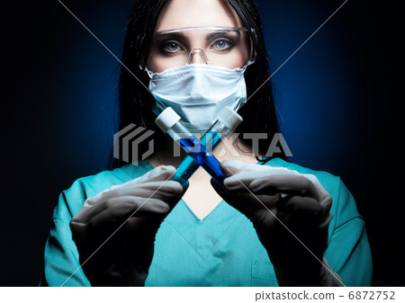scientist holding tubes in dark blue light 6872752