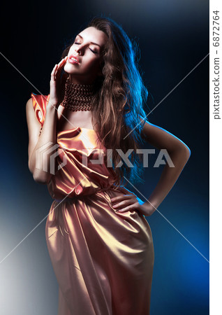 slim beautiful woman in pink dress slim beautiful woman in pink dress 6872764