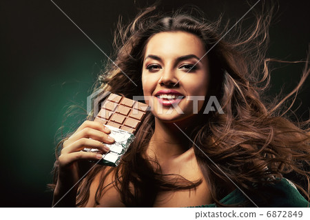 sexy young woman with bar of chocolate sexy young woman with bar of chocolate 6872849