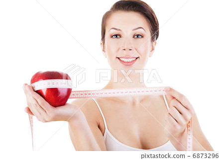 healthy woman with red apple and measure 6873296