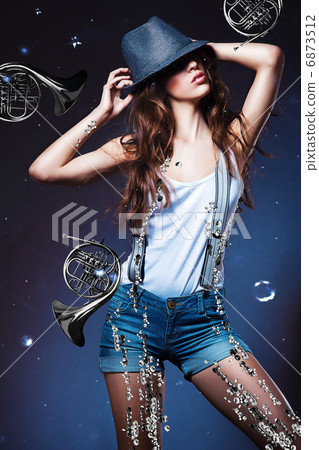 sexy pretty woman in shorts with suspenders in hat and horns sexy pretty woman in shorts with suspenders in hat and horns 6873512