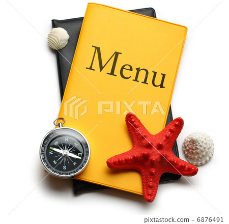 Yellow menu book, seastar and seashells Yellow menu book, seastar and seashells 6876491