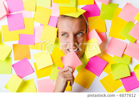 Woman with lots of reminder notes 6877812