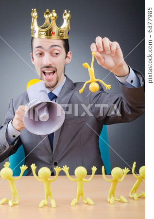 Boss with figures of his subordinates Boss with figures of his subordinates 6877985