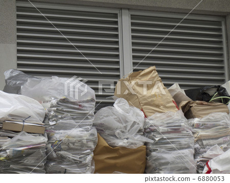 Garbage in newspaper magazines 6880053