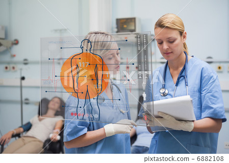 Nurses working on an interface 6882108