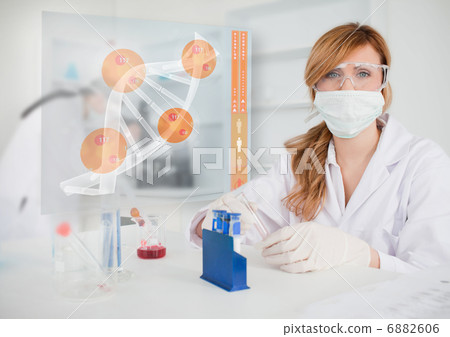 Female scientist conducting an experiment Female scientist conducting an experiment 6882606