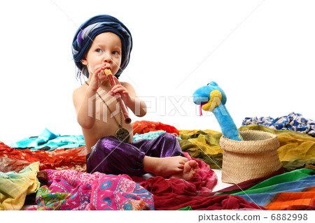 Charmer boy with pipe and snake 6882998