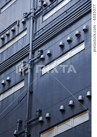 Ventilation opening on building wall 6885077