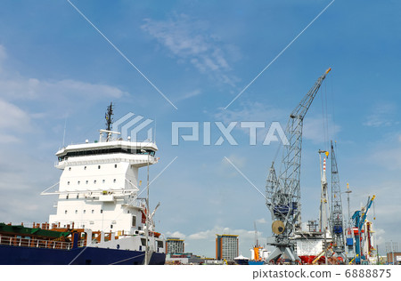 Industrial landscape. Ship and crane in shipyard 6888875