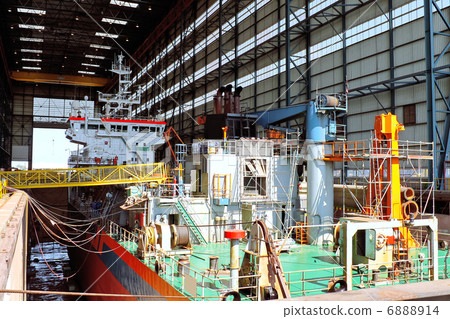 Ship in shipyard's covered dry dock 6888914