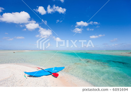 Kayak on a beach 6891694