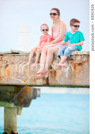 Mother and kids outdoors Mother and kids outdoors 6891926