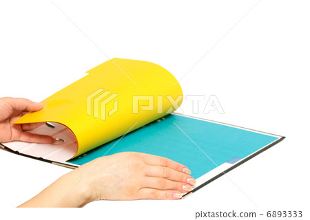 loose-leaf binder in hand 6893333