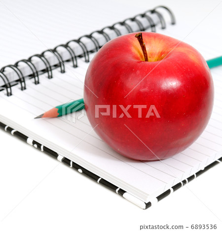 Notebook and apple 6893536