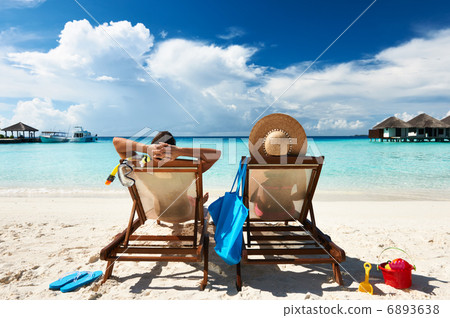 Couple on a beach Couple on a beach 6893638
