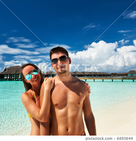 Couple on a beach at Maldives Couple on a beach at Maldives 6893649
