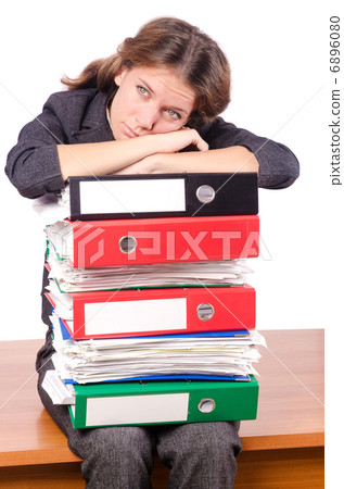 Businesswoman with lots of folders Businesswoman with lots of folders 6896080