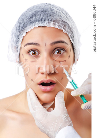 Woman under the plastic surgery Woman under the plastic surgery 6896344