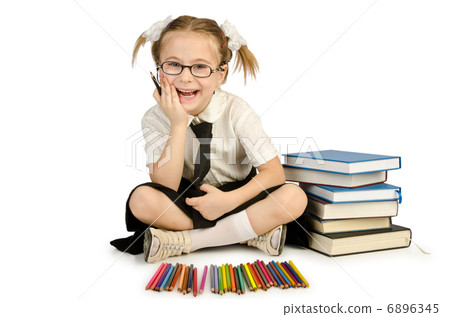 Little girl writing with pencils Little girl writing with pencils 6896345