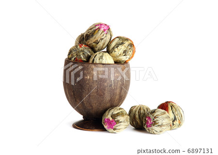 The leaves of green tea braided in balls. 6897131