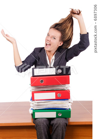 Businesswoman with lots of folders Businesswoman with lots of folders 6897306