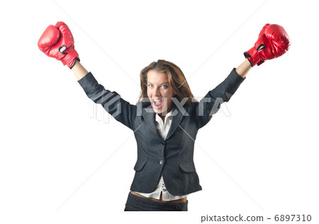 Young businesswoman in boxing concept Young businesswoman in boxing concept 6897310