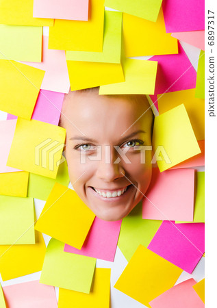 Woman with lots of reminder notes Woman with lots of reminder notes 6897317