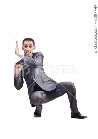 Young businessman pushing invisible obstacles Young businessman pushing invisible obstacles 6897444