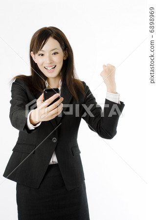 Smartphone and female employees Smartphone and female employees 6898969