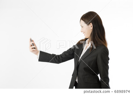 Smartphone and female employees 6898974