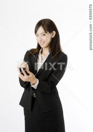 Smartphone and female employees Smartphone and female employees 6898976