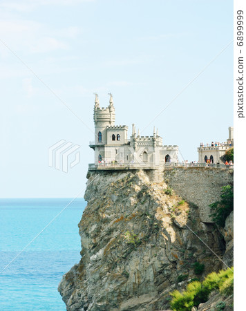 Swallow's Nest Castle tower, Crimea, Ukraine, with blue sky and sea on background 6899999