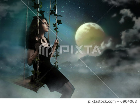 Beauty brunette swinging in night heaven Beauty brunette swinging in night heaven 6904068