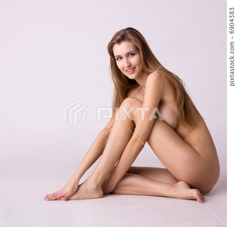 portrait of healthy smiling naked woman on gray background 6904383