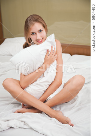 Portrait of Fresh and Beautiful woman on bed 6904490