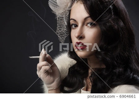 Retro Woman Portrait on dark background Retro Woman Portrait on dark background 6904661