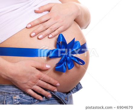 Pregnant woman hugs her belly isolated Pregnant woman hugs her belly isolated 6904670