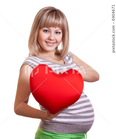 Happy pregnant woman hold red heart in hands 6904671