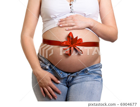 Pregnant woman hugs her belly isolated Pregnant woman hugs her belly isolated 6904677