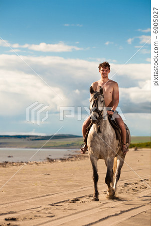 Horseman on the beach Horseman on the beach 6905027