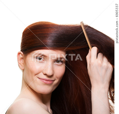 portrait of a beautiful young woman comb wonderful hair portrait of a beautiful young woman comb wonderful hair 6905337