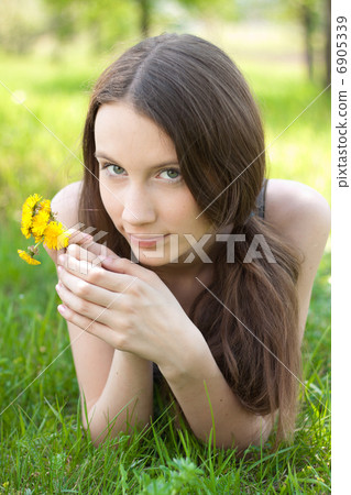 young beautiful teenager with dandelion bouquet young beautiful teenager with dandelion bouquet 6905339