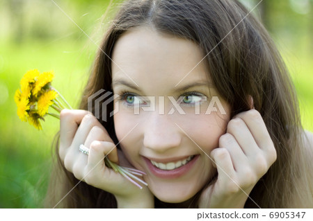 young beautiful teenager with dandelion bouquet young beautiful teenager with dandelion bouquet 6905347