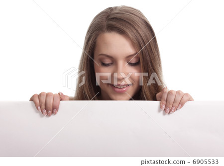 young woman looking down a white sign young woman looking down a white sign 6905533