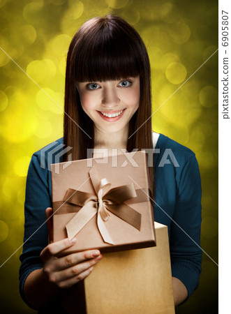 Happy Teen Girl with Gift Happy Teen Girl with Gift 6905807