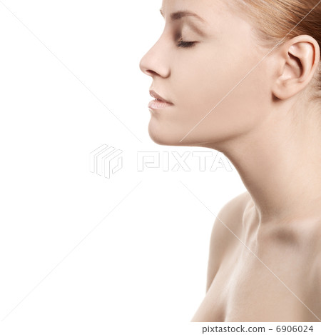 Beautiful womans face with clean skin - isolated on white 6906024