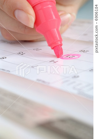 calendar and a marker 6906184