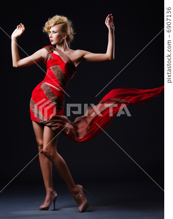 Woman in nice dress in studio Woman in nice dress in studio 6907136